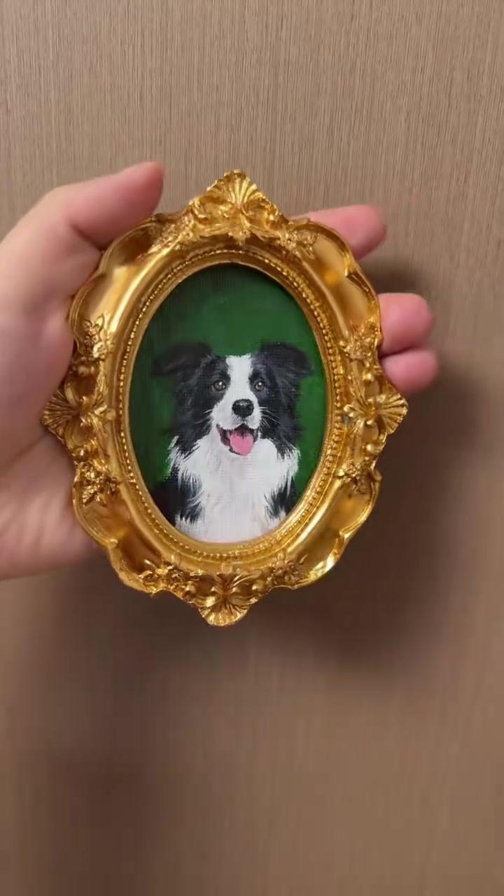Original photograph of the miniature portrait held in a hand
